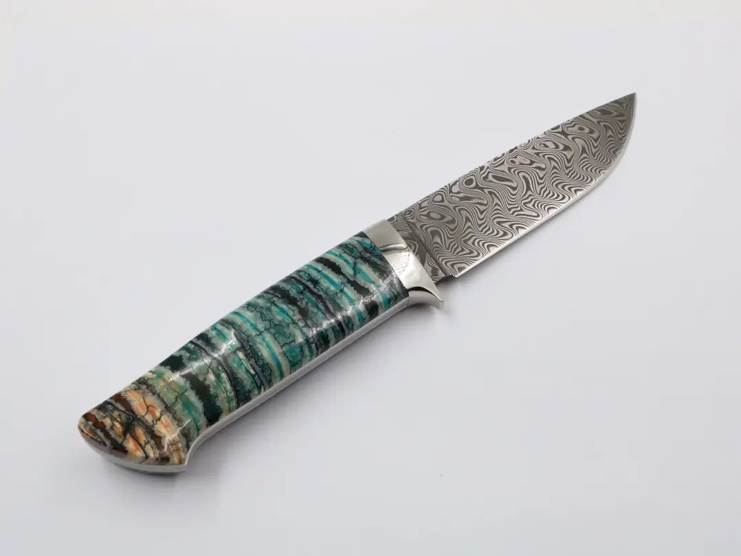 Griff aus fossilem Mammutbackenzahn – Naturmaserung in Nahaufnahme