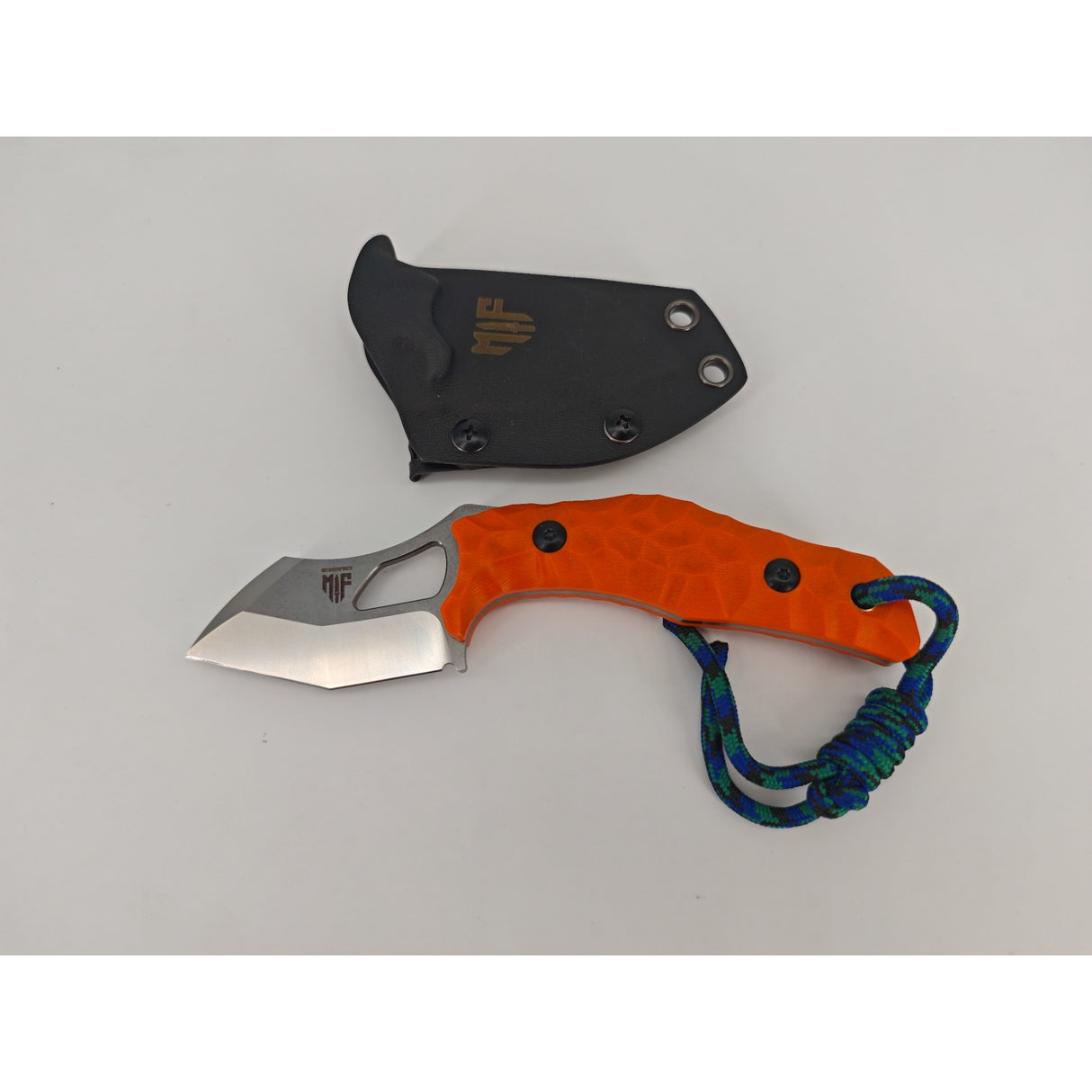 Geöffnete T Rex Kralle Orange – Blick auf Schneide und ergonomischen Griff