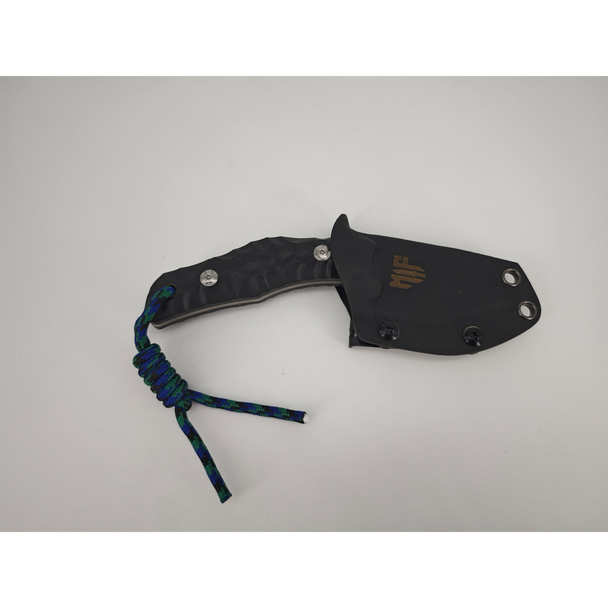 T Rex Kralle mit schwarzem G10-Griff und Kydex-Scheide in Draufsicht