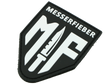 Messerfieber Logo-Patch aus Gummi/Kunststoff in Schwarz und Weiß