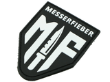 Messerfieber Logo-Patch aus Gummi/Kunststoff in Schwarz und Weiß